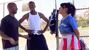 Horny Young Cheerleader May Lee Has Her Pussy Pounded By Two Black Men