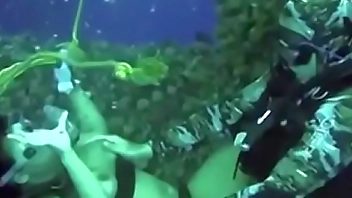 Fucking this busty cutie underwater while scuba diving