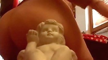 A votive angel is corrupted in a truly blasphemous way