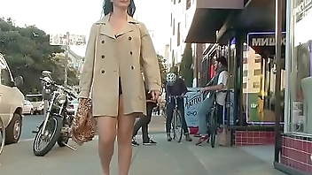 Babe in lingerie and coat in public