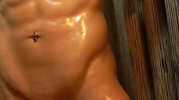 Bodybuilder With Huge Fake Tits Oils Up