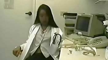 Asian nurse caught masturbating in her office with toys