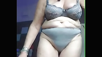 Granny fucks hairy pussy with cucumber