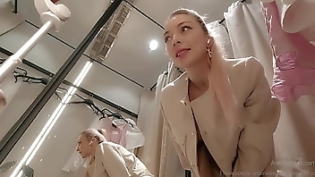 Online date in fitting room with open curtain. Public video call.